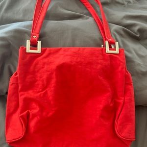 Red bag, NEW. Many pockets inside. Easy to carry your stuff, organizing.